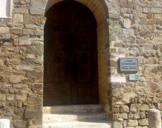 La porta di ingresso della ormai ex sede dell'Ufficio Turistico di Montalcino